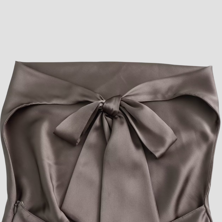 Women's elegant sleeveless halter tank top featuring beautiful draping, ideal for sophisticated wear.