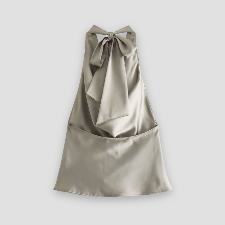 Stylish women's draped halter tank top. Elegant sleeveless design for chic summer and evening apparel.