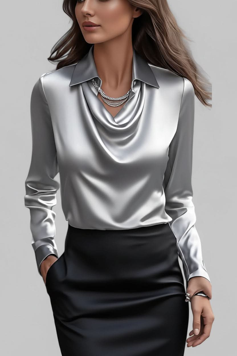 Sophisticated women's fashion top, featuring a flattering draped design and long sleeves for day to night.