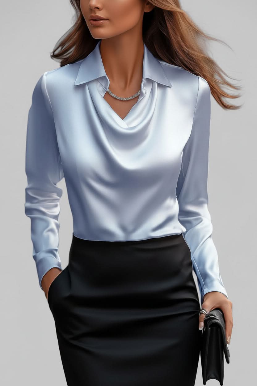 Fashionable women's draped top with long sleeves, great for office wear or a refined casual ensemble.