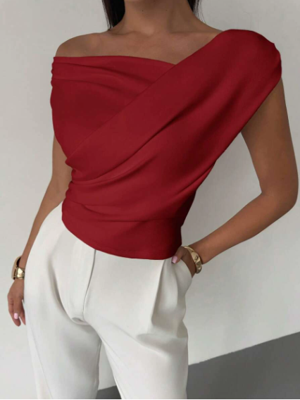 Sophisticated women's draped shoulder blouse, an elegant fashion top for any occasion.
