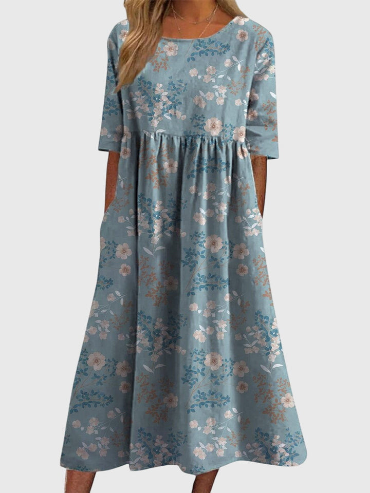 Comfortable women's embroidered midi dress in a flowy design, perfect for effortless casual chic.