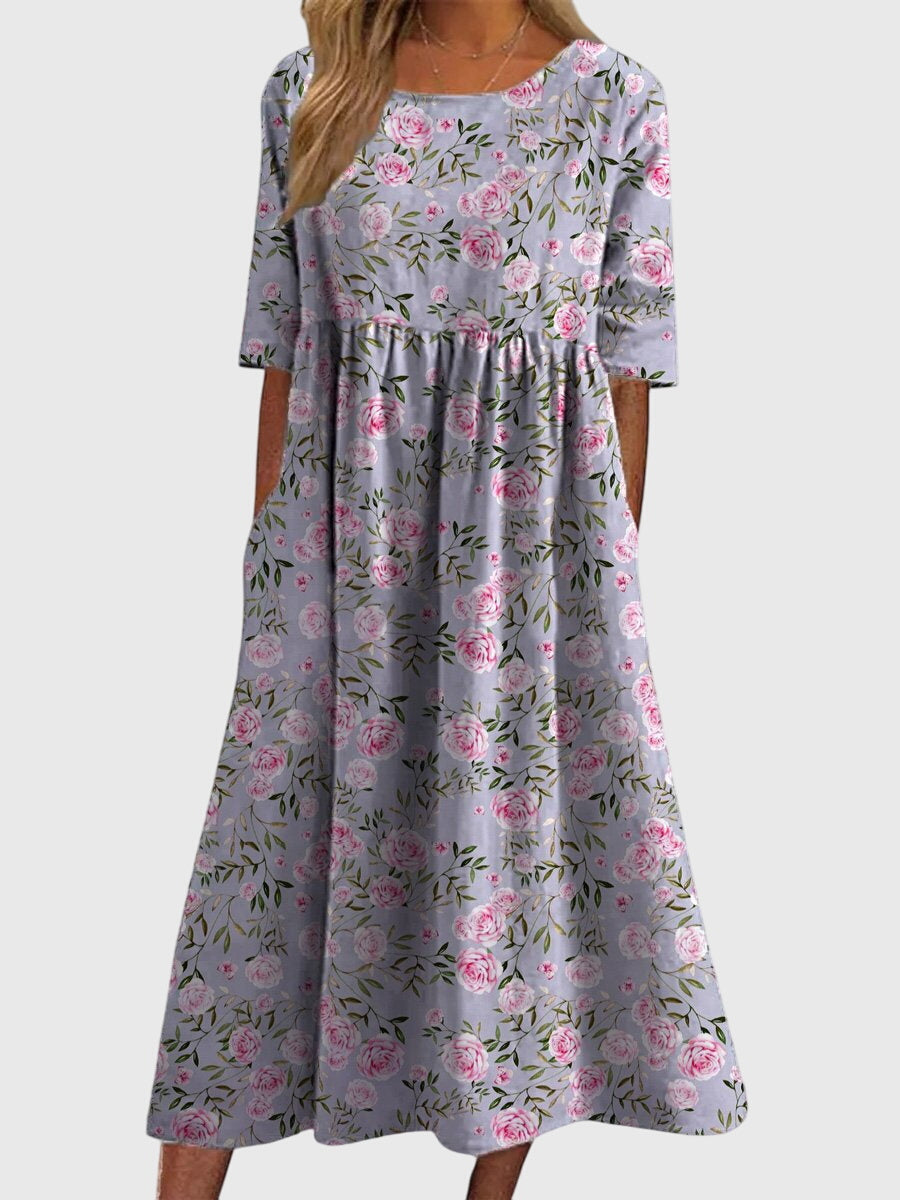 Chic women's embroidered flowy midi dress, an elegant choice for spring occasions or summer events.
