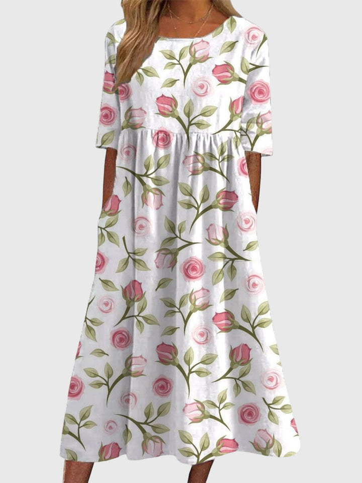 Stylish women's embroidered flowy midi dress in forest green, a comfortable & flattering summer essential.