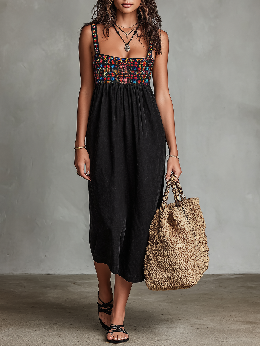 Elegant women's embroidered sleeveless midi dress, perfect for summer vacations or casual day wear. Relaxed fit.