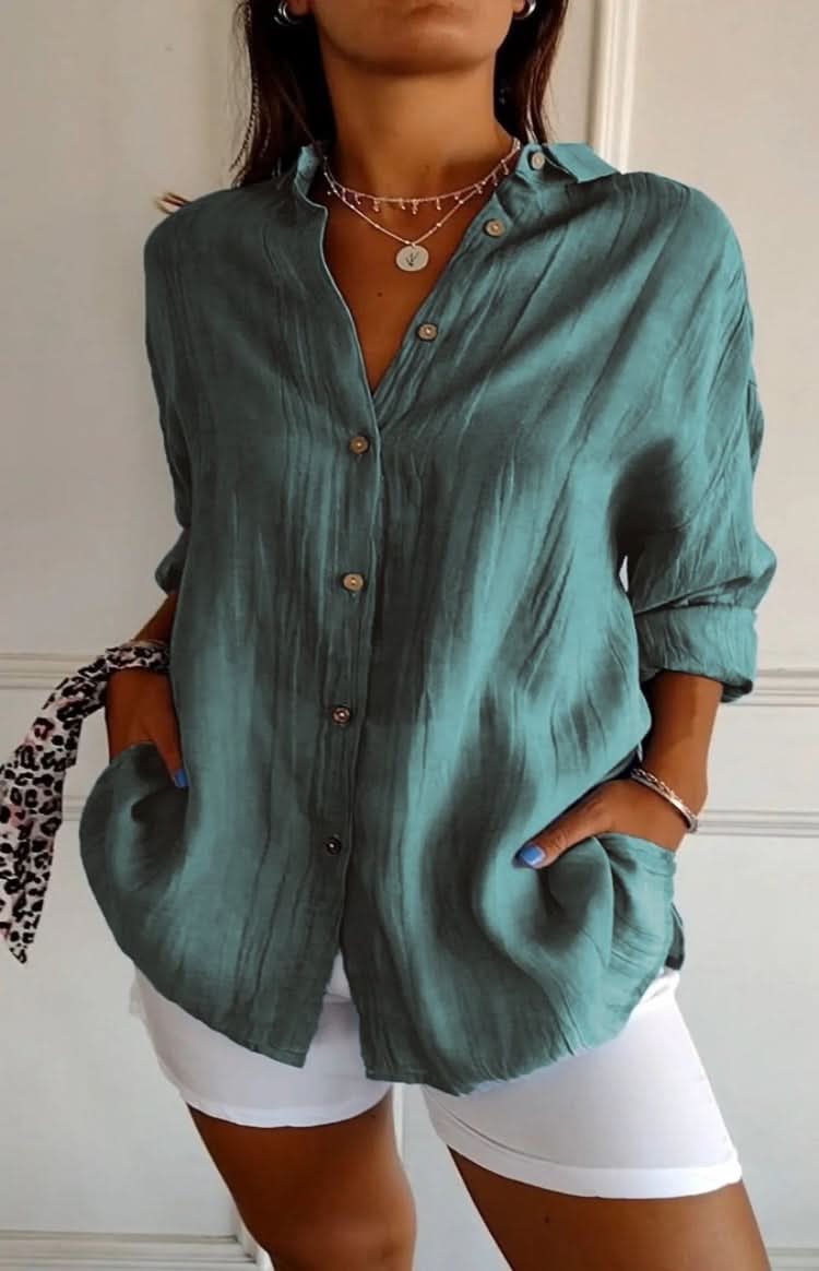 Stylish women's long-sleeve blouse, elegant everyday top, versatile for chic office and casual outfits.