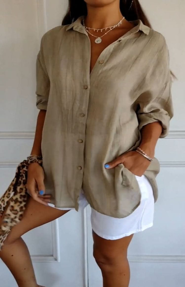 Sophisticated women's everyday blouse, versatile long-sleeve top, elegant for office or casual wear.