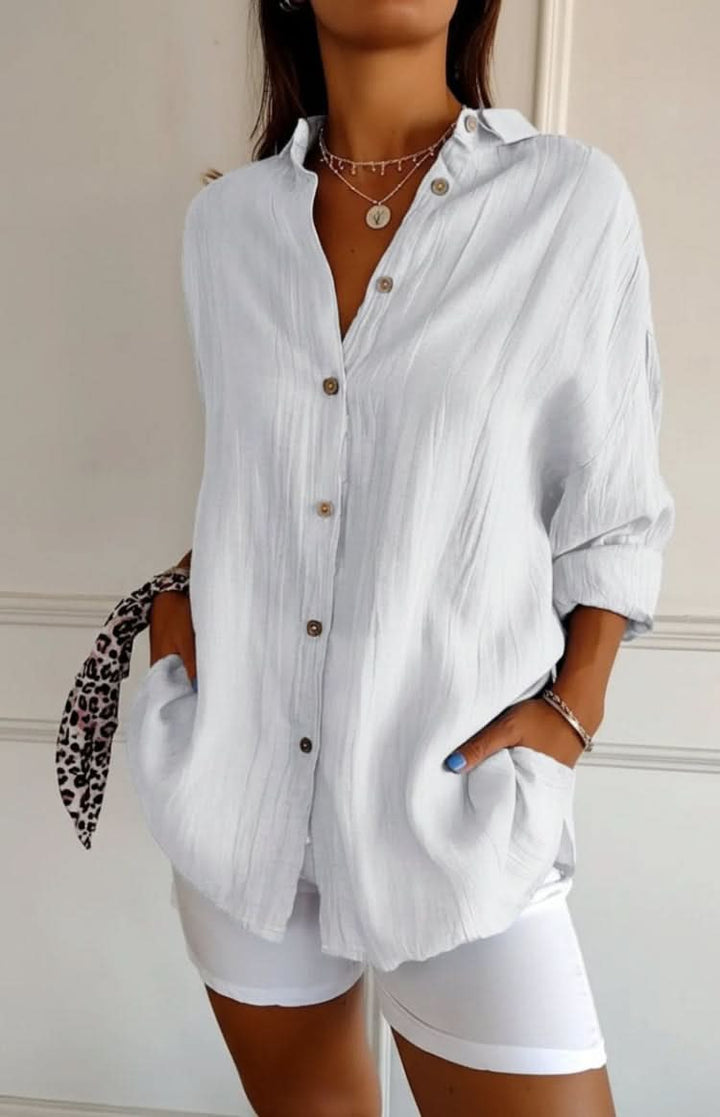Elegant long-sleeve women's blouse, a sophisticated everyday top perfect for versatile styling.