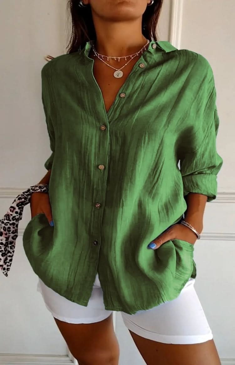 Chic women's office blouse, elegant long-sleeve top for professional yet versatile everyday style.