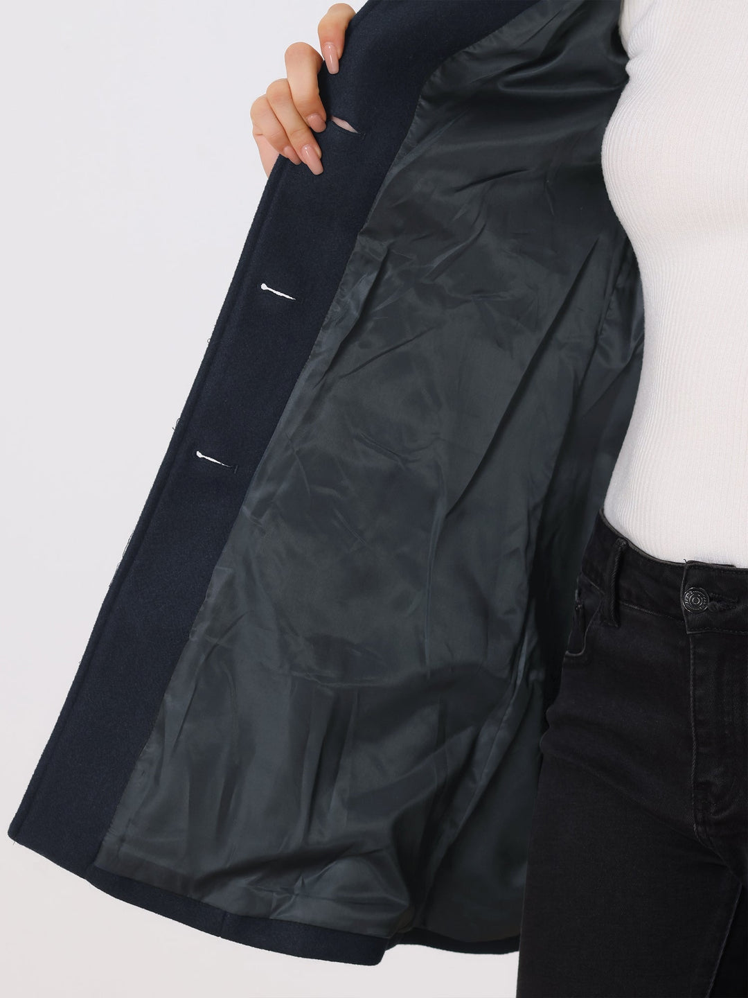 Flattering women's fitted trench coat with elegant button closure, stylish long workwear for autumn.
