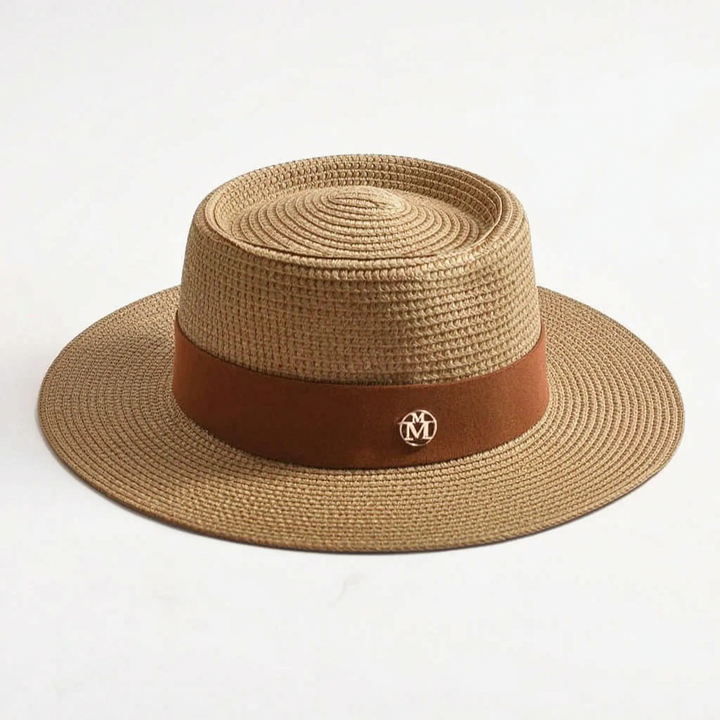 Classic women's flat top wide brim sun hat, an elegant fashion statement for summer, beach & travel.