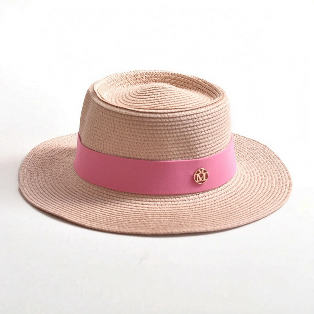 Women's vacation wide brim sun hat with a flat top, perfect for beach, resort, and sunny adventures.