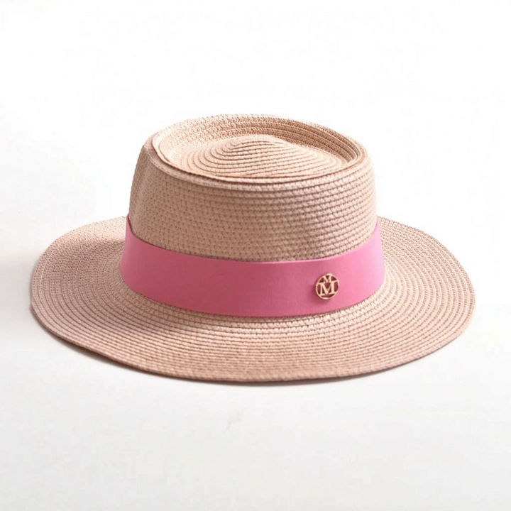 Women's vacation wide brim sun hat with a flat top, perfect for beach, resort, and sunny adventures.