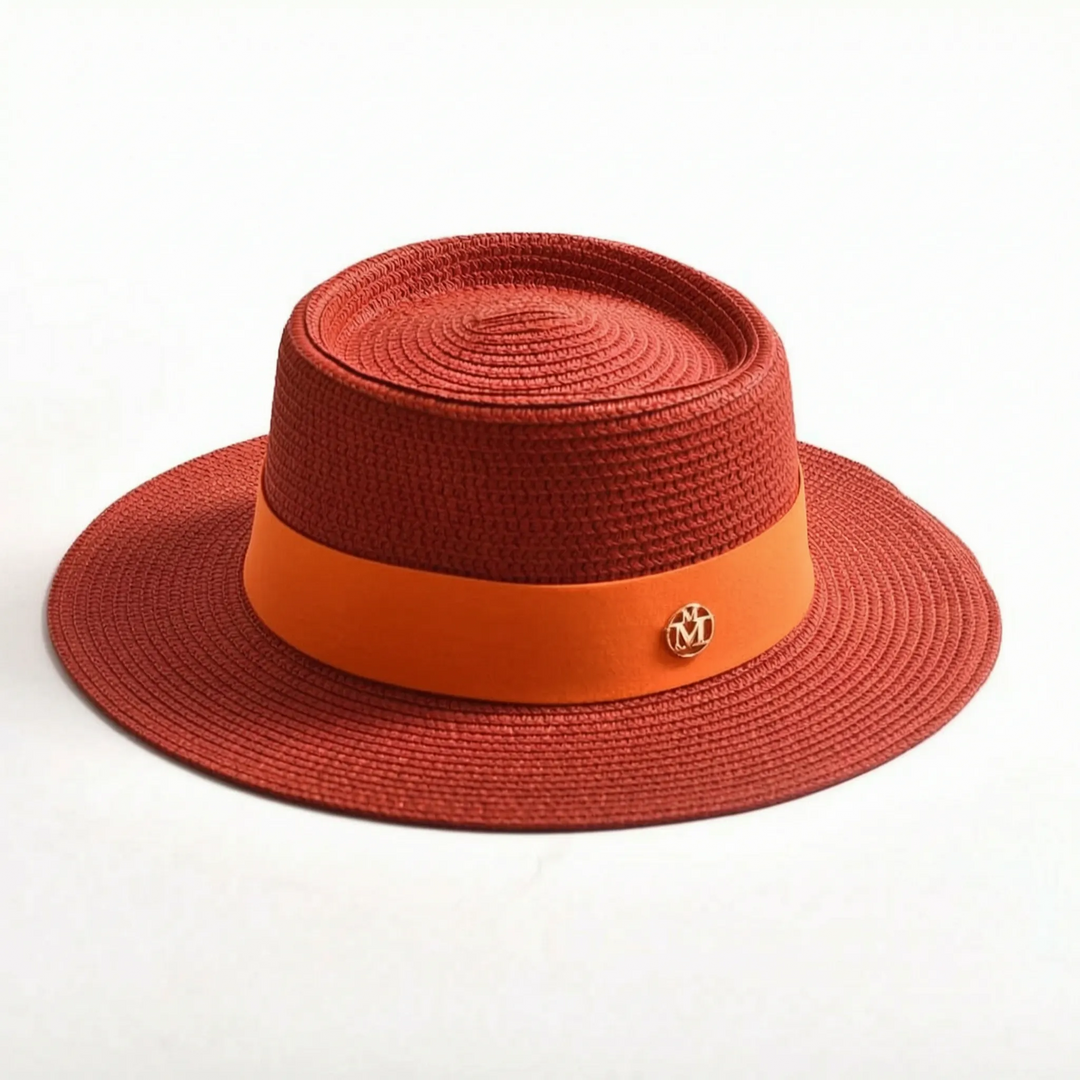 Trendy women's flat top wide brim sun hat, offering chic style and sun protection for summer and travel.