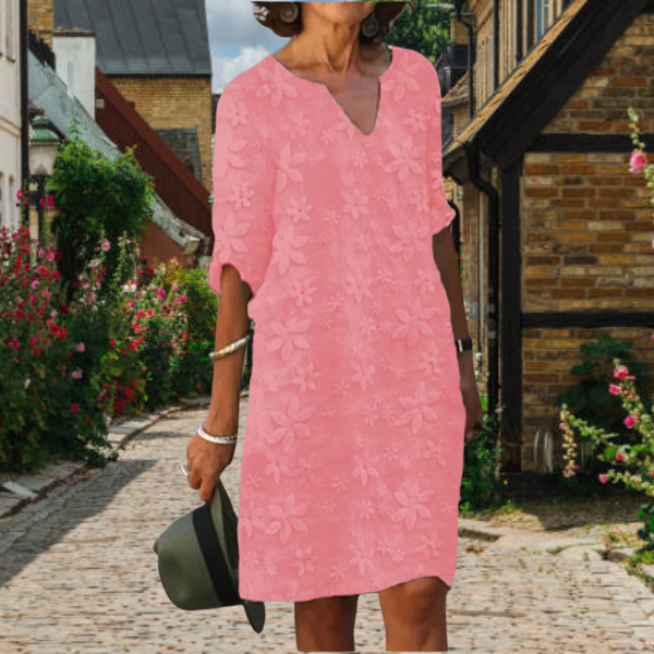 Relaxed fit women's midi dress with intricate floral appliqué, 3/4 sleeves, and chic notch neck, ideal for summer.