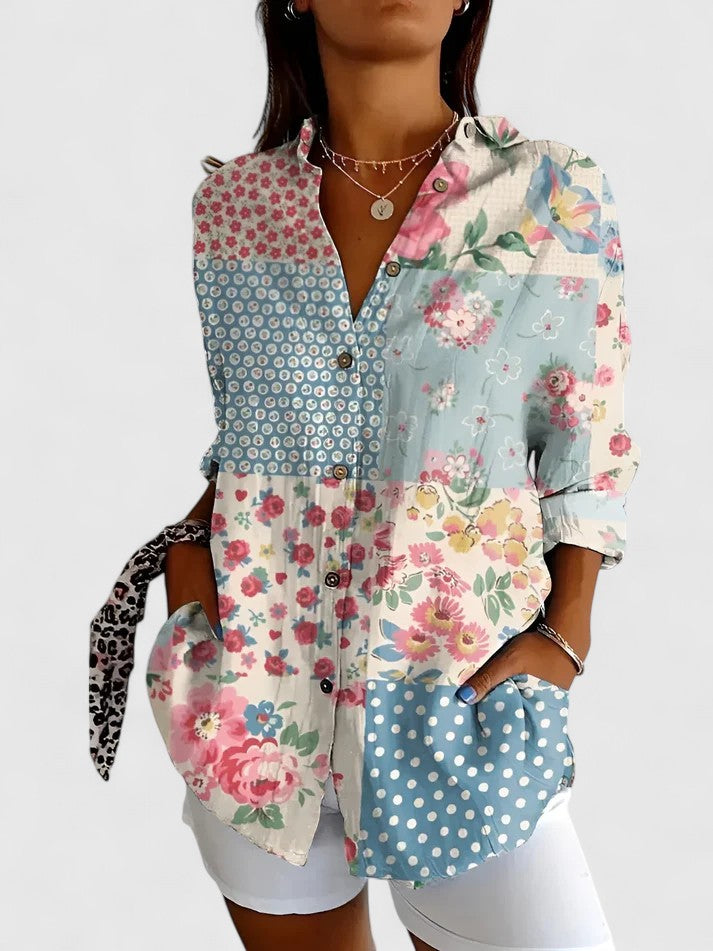 Elegant women's floral blouse, chic and versatile for office or casual wear.