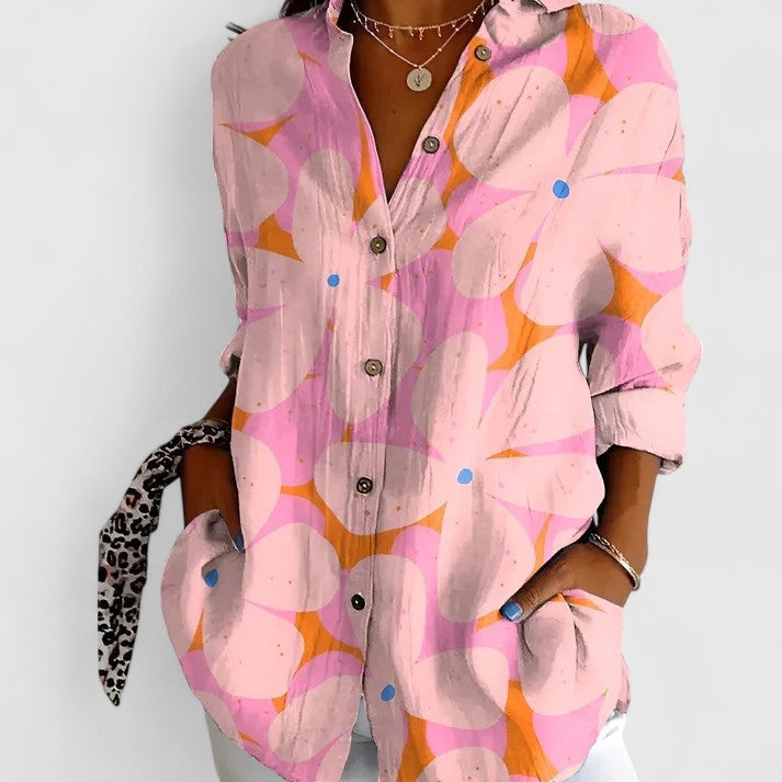 Green women's floral print blouse, chic and versatile for spring fashion or casual elegance.
