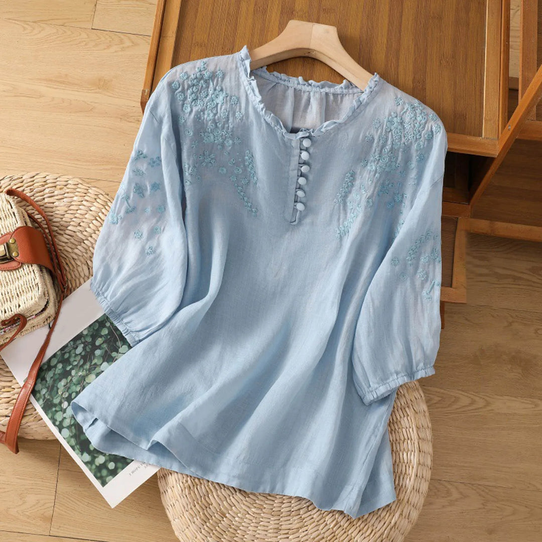 Elegant women's floral button-front blouse. Perfect for spring & summer, lightweight & chic style.