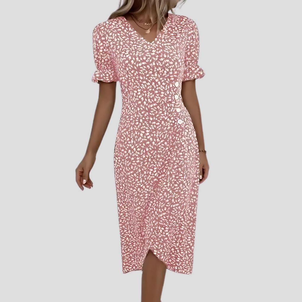 Flowy floral midi dress for women, featuring a button-front and short sleeves, great for comfortable spring & summer wear.