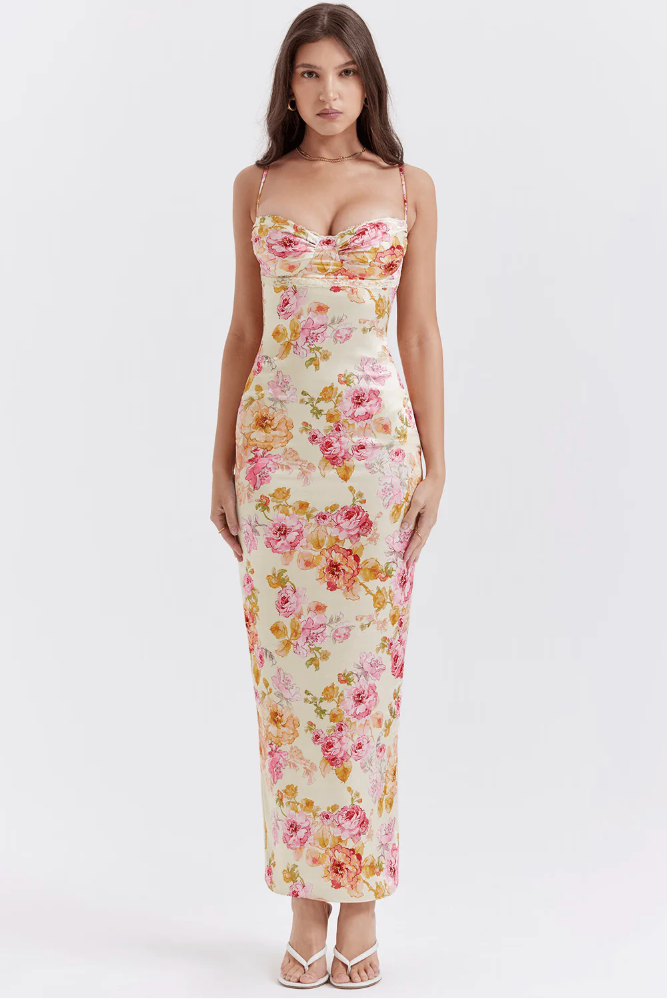 Feminine floral slip maxi dress with supportive corset, a stunning choice for formal wedding guests.