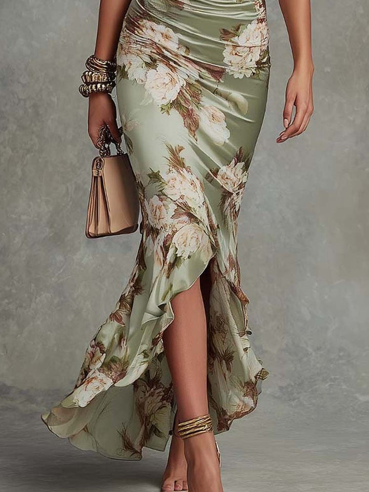 Elegant floral V-neck fishtail maxi dress for women, featuring a ruched waist. Perfect as a party or occasion dress.