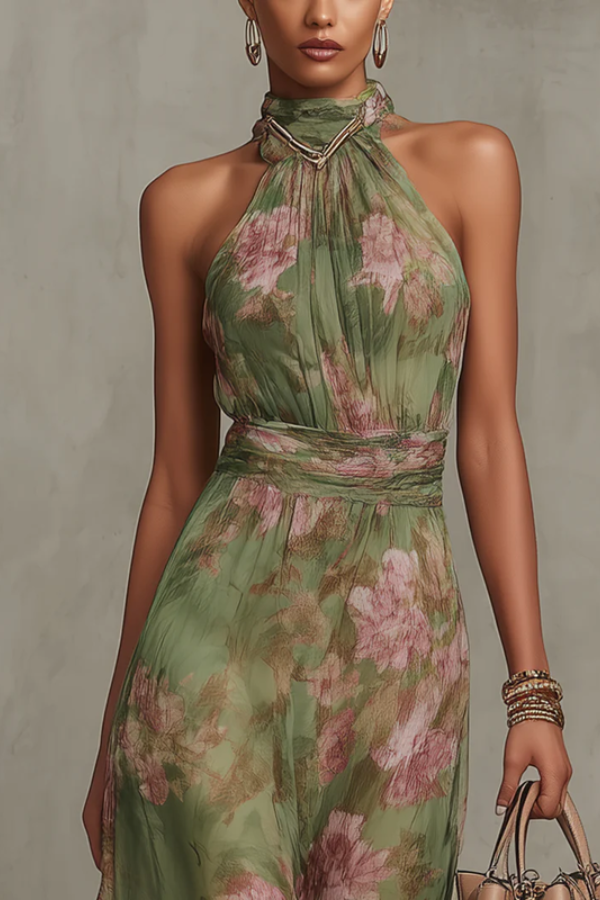 Chic women's floral halter maxi dress with flowing fabric for elegant summer vacations & special occasions.