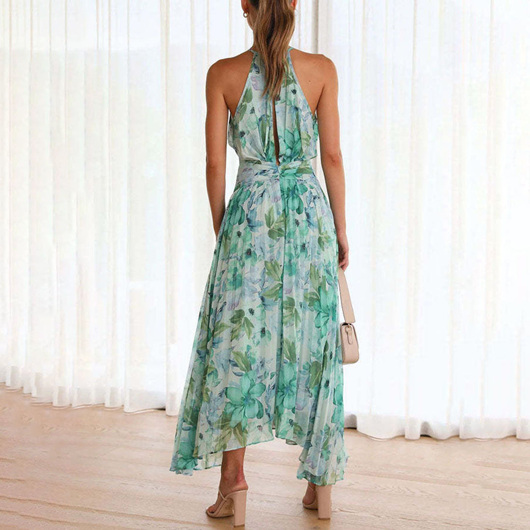 Stunning floral print maxi dress for women, featuring a chic halter neckline. Elegant wedding guest attire.