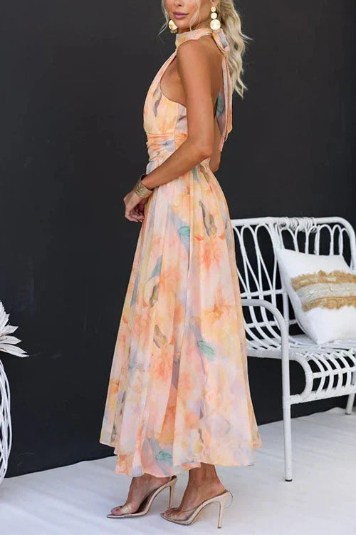 Stylish women's floral long dress, a perfect halter neck maxi for weddings, parties, or resorts.