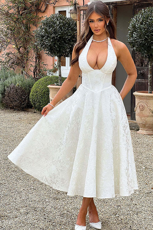 Chic floral midi party dress featuring a unique corset halter design for a striking silhouette.