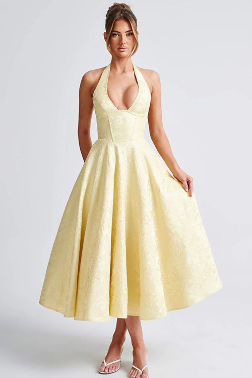 Women's elegant floral midi dress, ideal for weddings, featuring a halter neck and corset top.