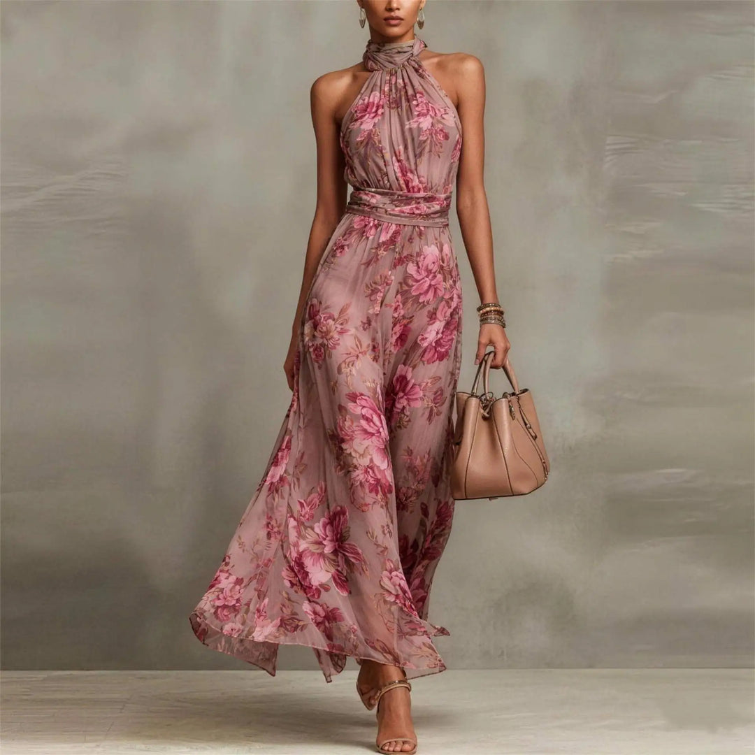 Stylish women's sleeveless floral maxi dress with halter neck. Perfect flowy summer dress for elegant resort wear.