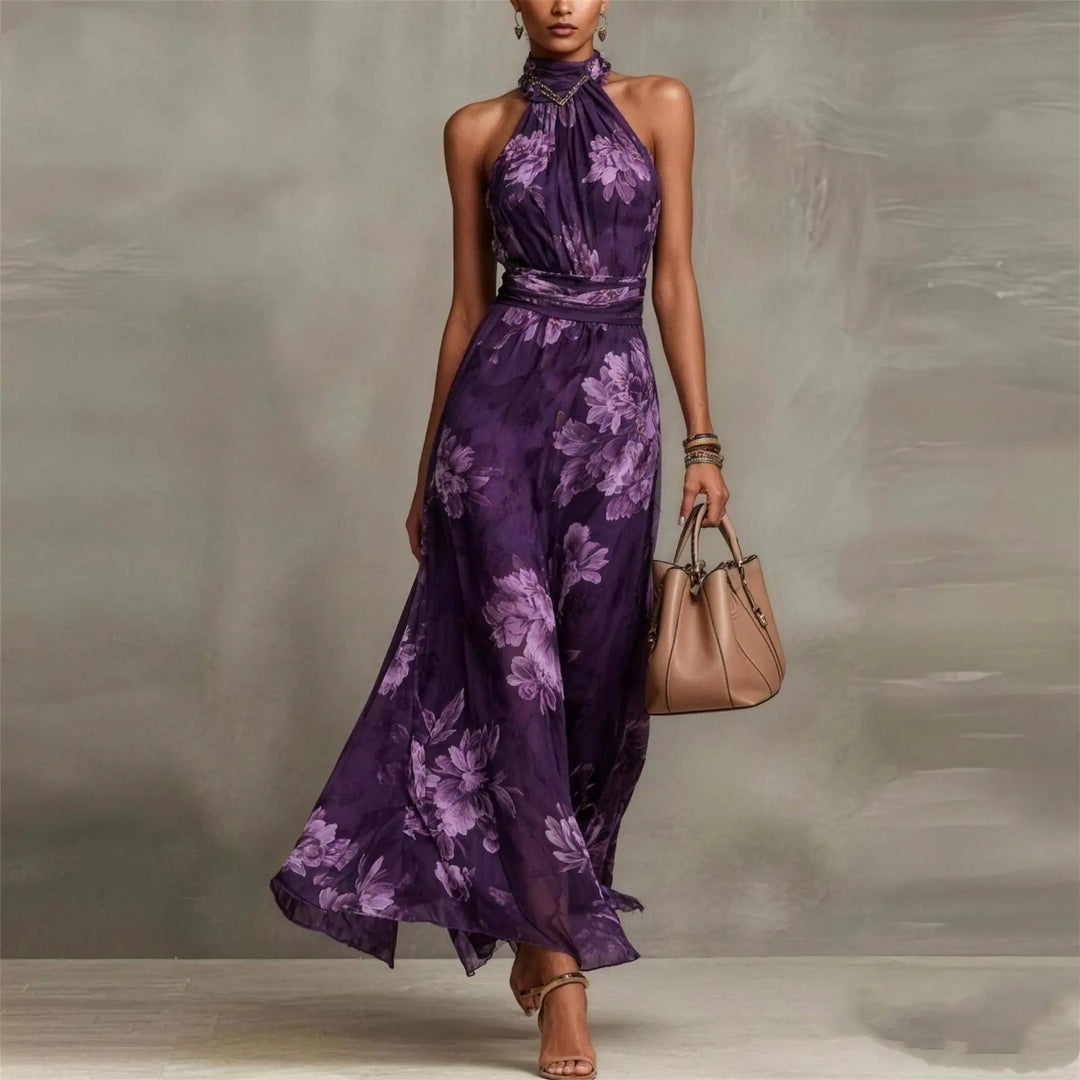 Women's floral halter neck maxi dress. Elegant summer flowy sleeveless dress for vacation, resort, or party wear.