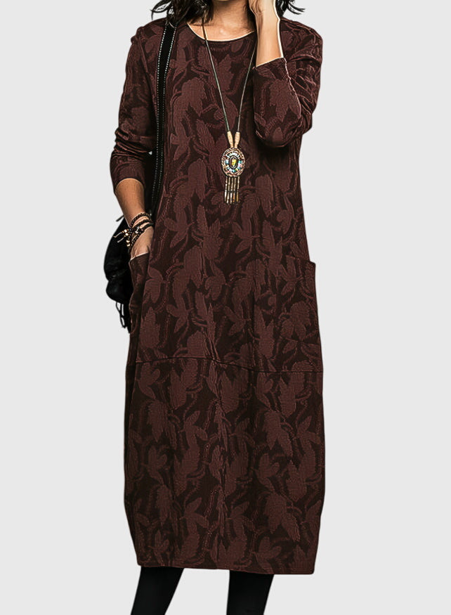 Comfortable women's effortless floral jacquard midi dress, featuring stylish design and practical pockets.