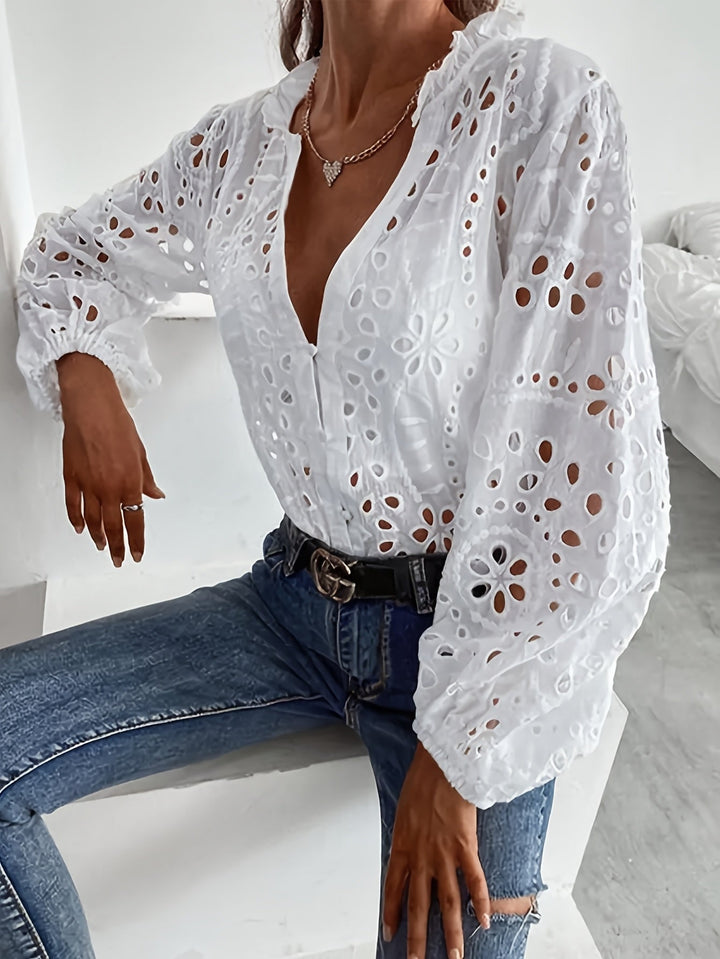 Beautiful women's floral long-sleeve blouse, an elegant button-up top for versatile work or casual spring wear.