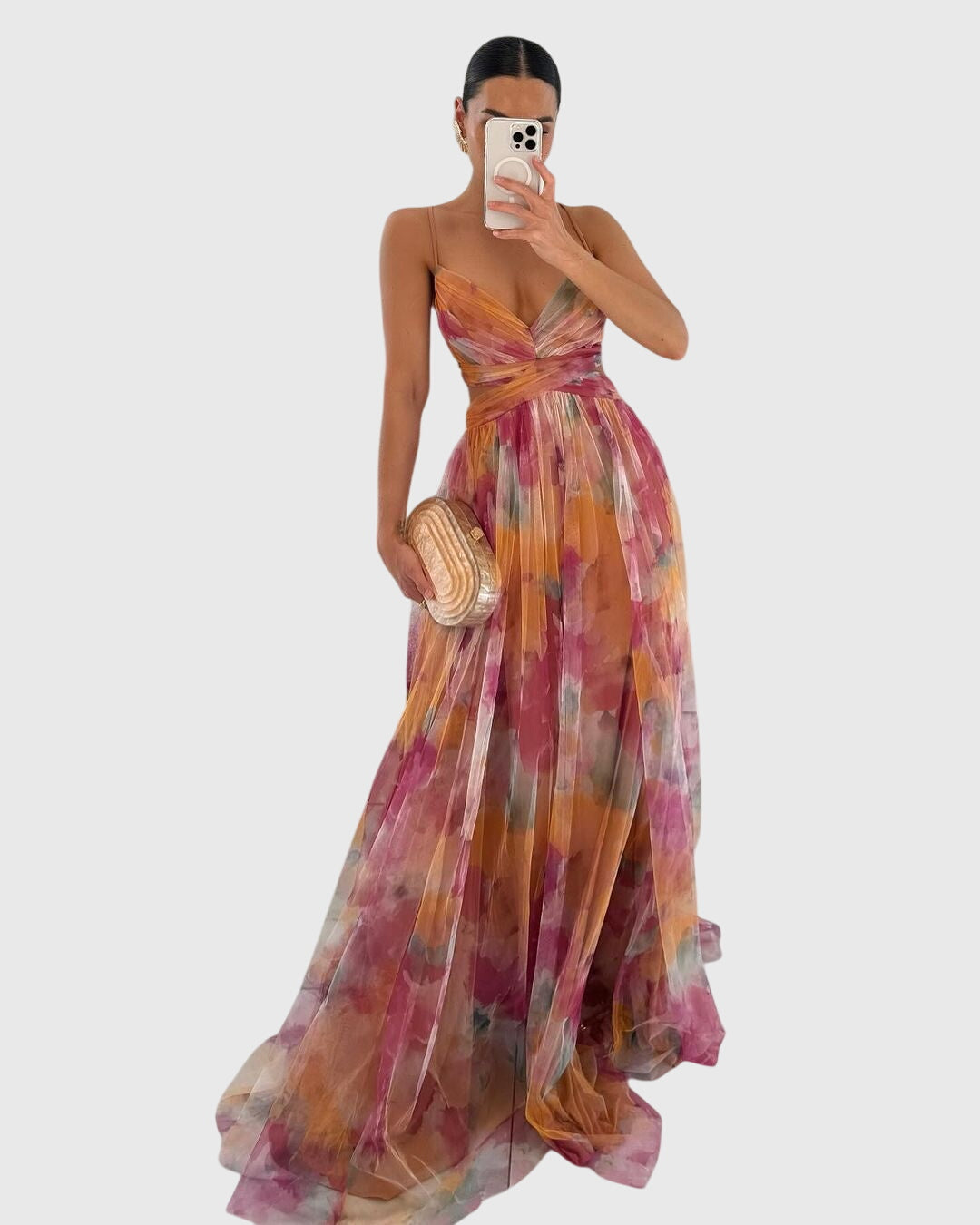 Elegant women's floral maxi dress with adjustable straps, perfect for summer vacations and events.