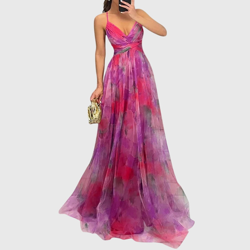 Charming women's floral maxi dress with adjustable straps, perfect for beach or casual summer outings.