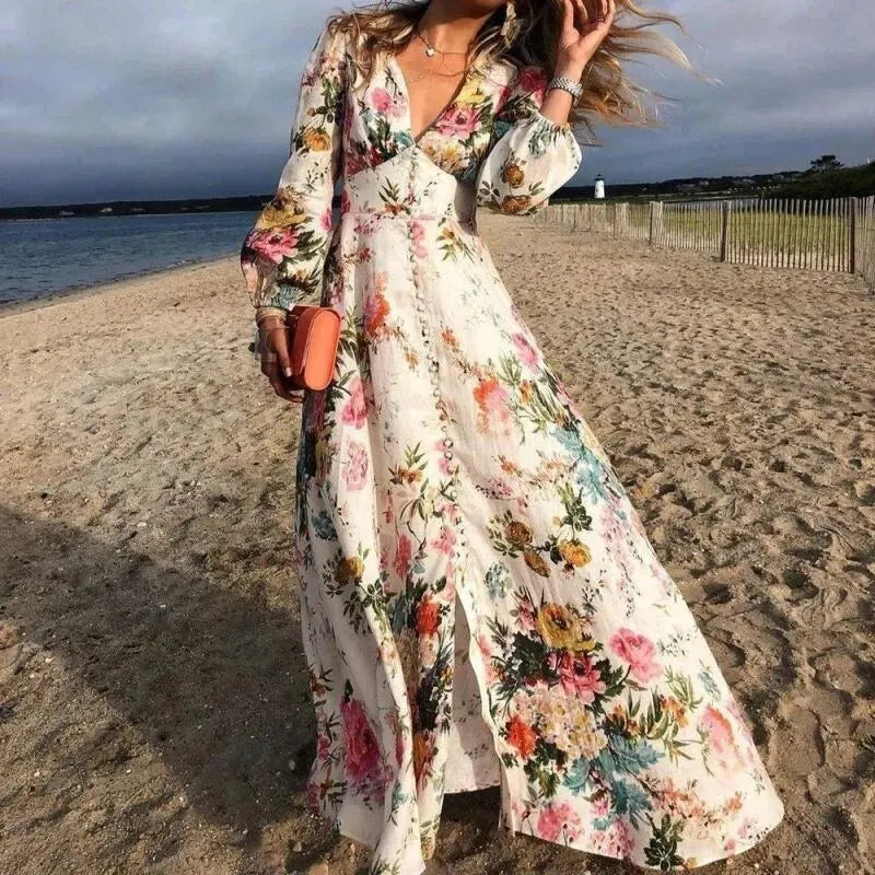 Elegant women's floral maxi dress with long sleeves and a v-neck. Perfect for bohemian beach or spring/summer styles.