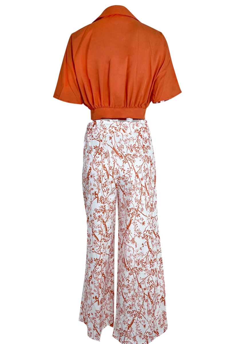 Women's vibrant floral print high-waist maxi skirt with a stylish crop top, a fashionable two-piece.