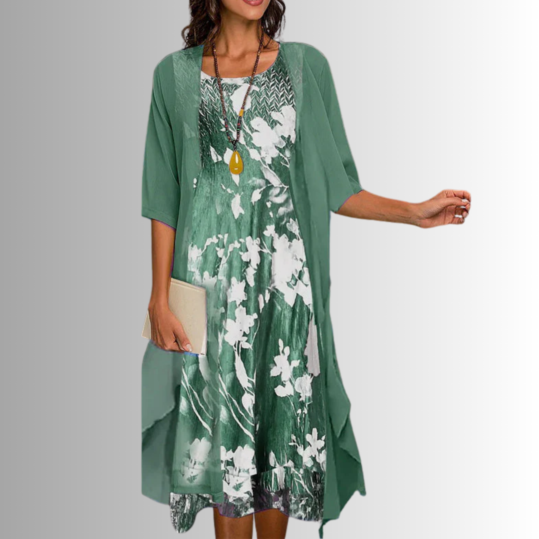 Elegant women's floral midi dress & matching long sleeve cardigan set, perfect for spring/summer occasions.