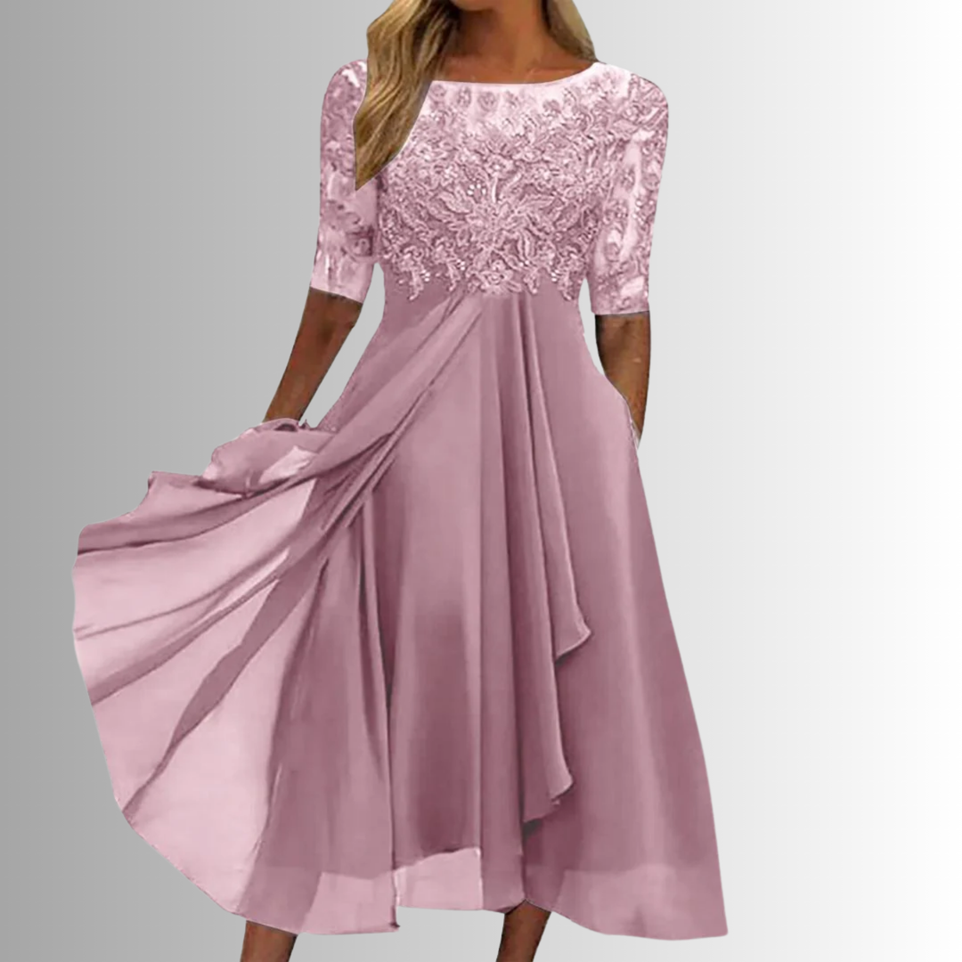 Close-up: Sophisticated floral print on an elegant midi dress, ideal for formal evening events.