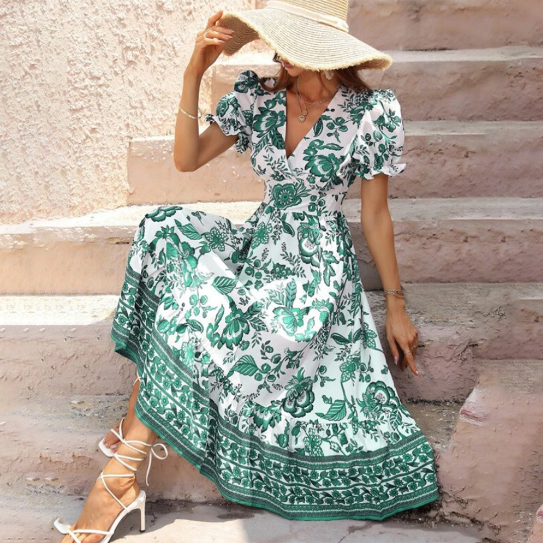 Front view: Elegant women's floral midi dress, V-neck, puff sleeves, for stylish spring/summer wear.