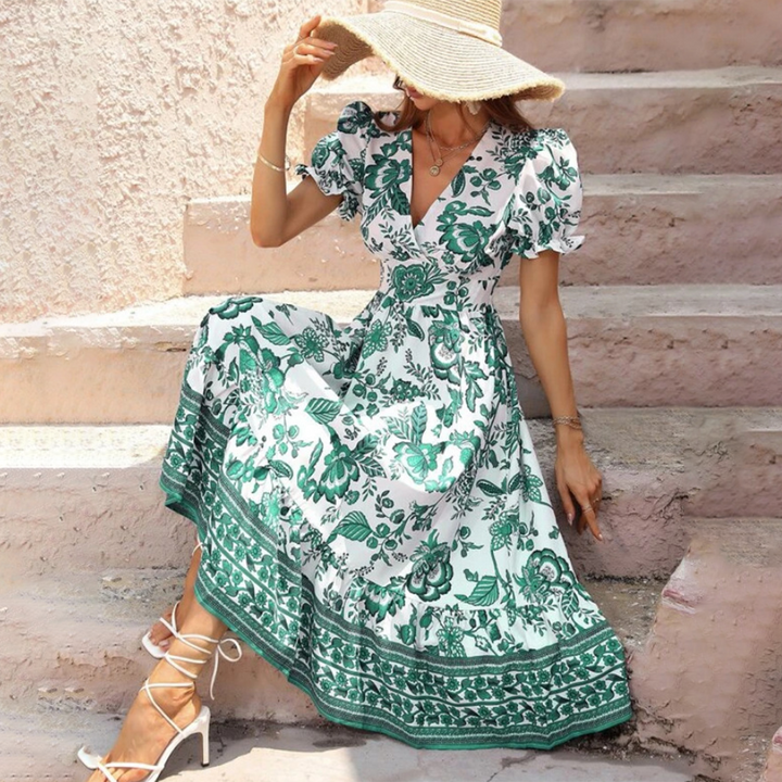 Front view: Elegant women's floral midi dress, V-neck, puff sleeves, for stylish spring/summer wear.