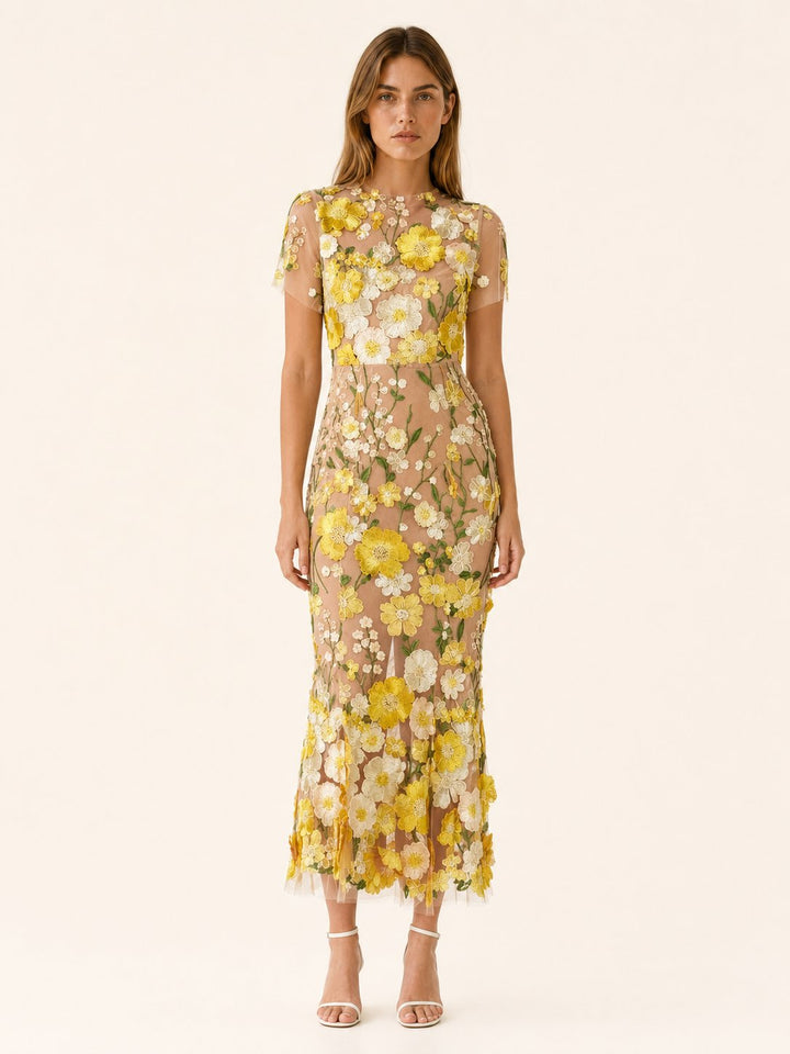 Elegant women's floral midi wedding guest dress with short sleeves & round neck for summer occasions.