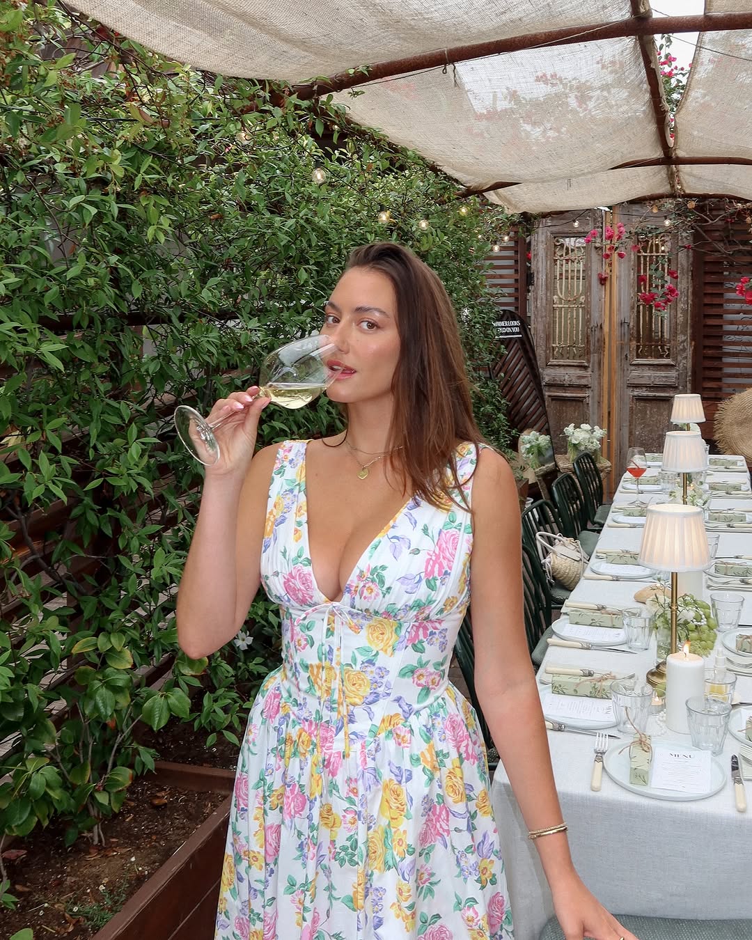 Flattering A-line floral midi dress for women, featuring a V-neck and corset bodice, ideal for garden parties.
