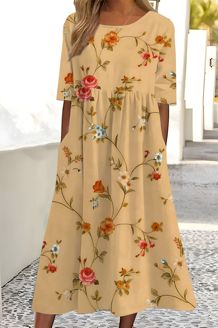 Elegant women's floral midi wrap dress, perfect for summer. Flattering, multicolored design for day or evening wear.