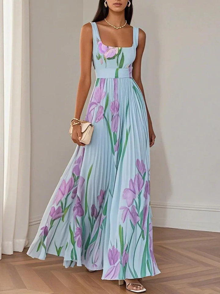 Stunning women's sleeveless floral maxi dress featuring a square neck & pleated skirt, ideal for elegant wedding guests.