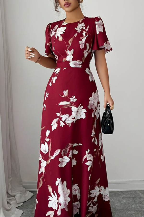 Vacation-ready women's floral midi dress with sophisticated pleats, comfortable & chic.