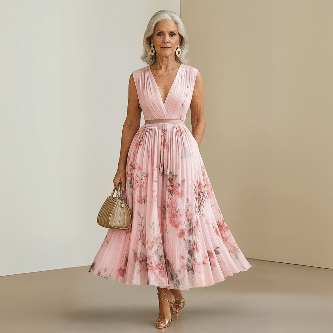 Elegant women's floral pleated V-neck midi dress, perfect for wedding guest attire or sophisticated parties.