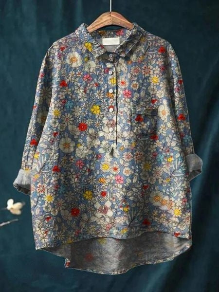 Chic women's blouse with vibrant floral print, feminine and elegant.