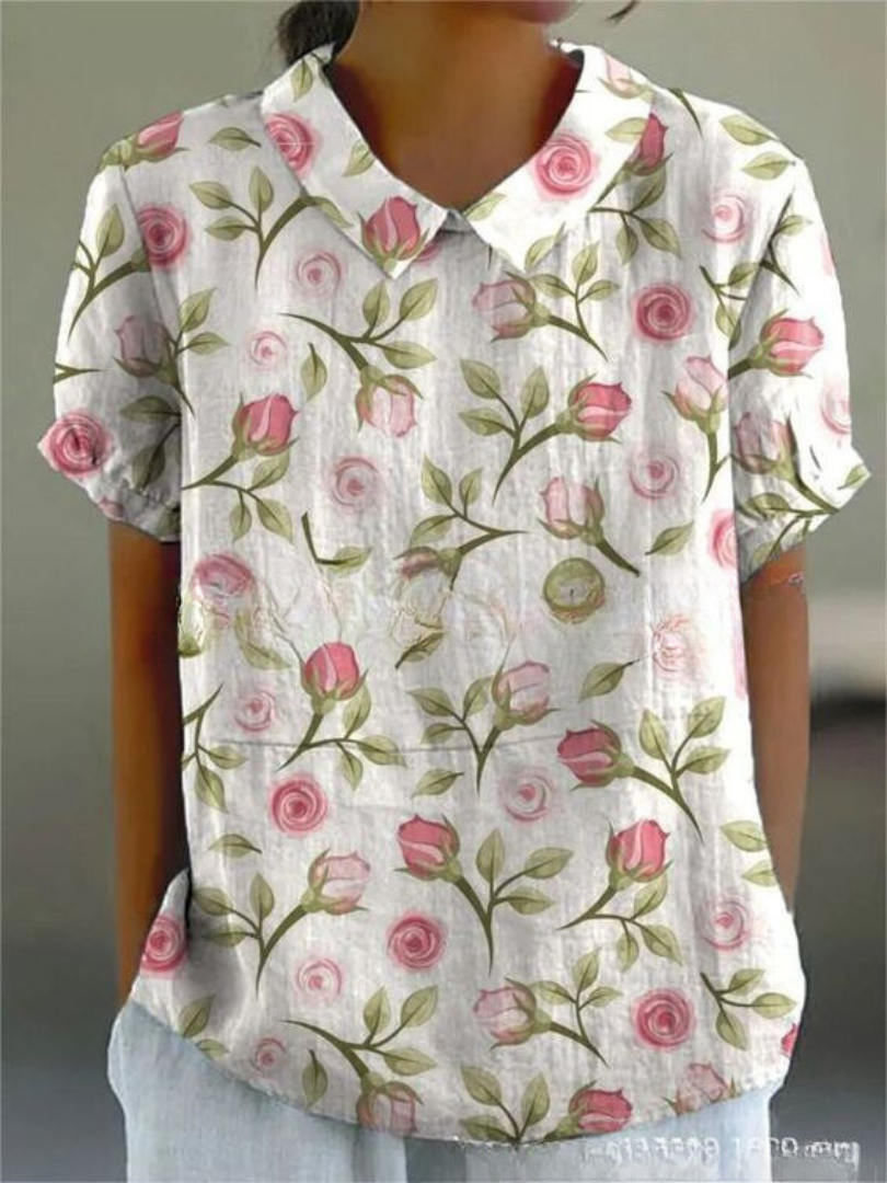 Comfortable women's floral blouse, relaxed fit with elegant print, a versatile top for spring/summer wear.